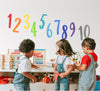 Load image into Gallery viewer, MEDIUM Watercolor Rainbow Numbers Wall Decal Set • 1-10 • Removable Fabric Wall Stickers • Colors of the Rainbow Collection